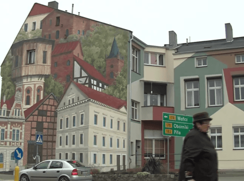 Taki pełen symboli mural ozdobił centrum - grafika