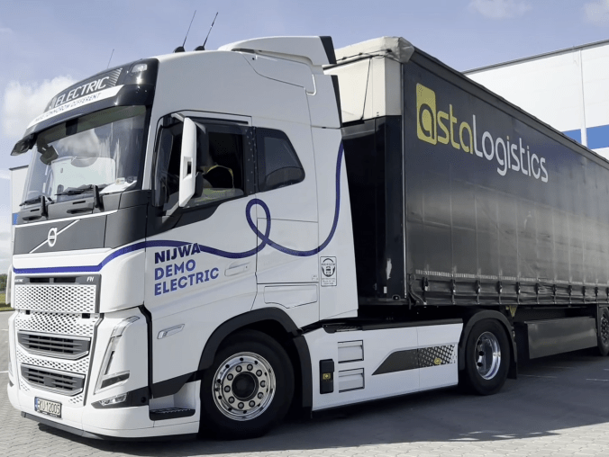 Elektryczne ciężarówki w Asta Logistics - grafika