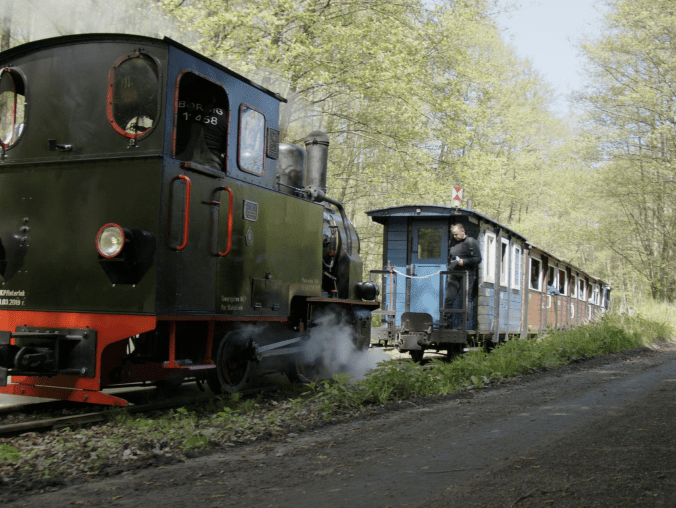 Para buch, koła w ruch - grafika